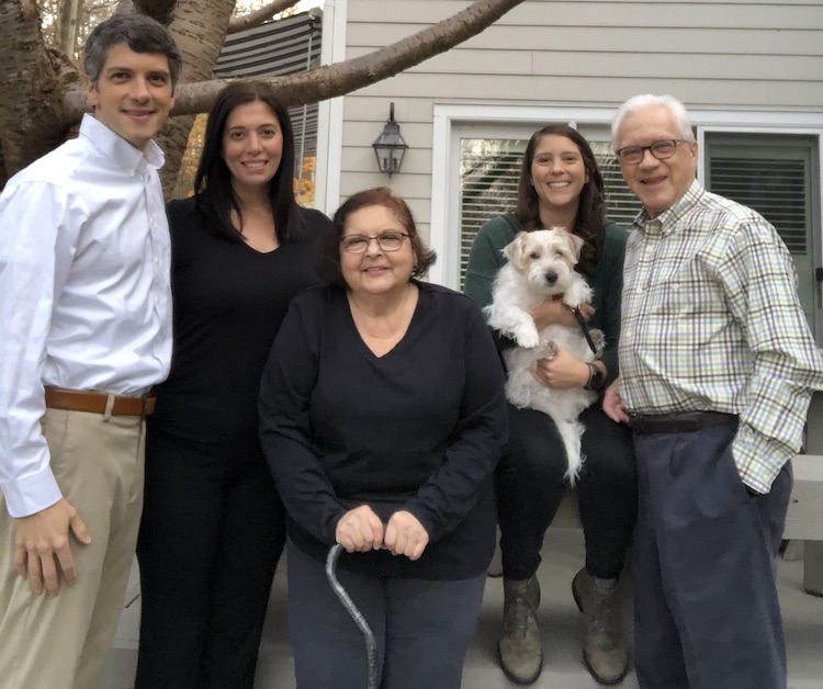 The Archuleta family: (Left to Right) Henry, Elena, Felice, Christine holding Ziti; the family’s beloved Jack Russell Terrier, and Bob.