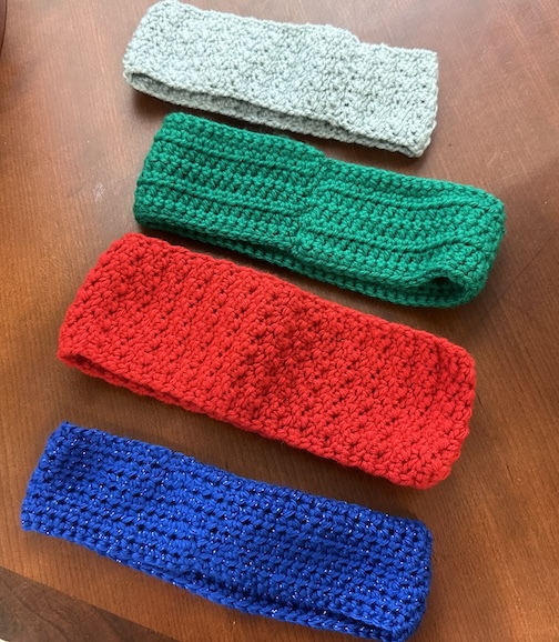 crocheted headbands in several colors