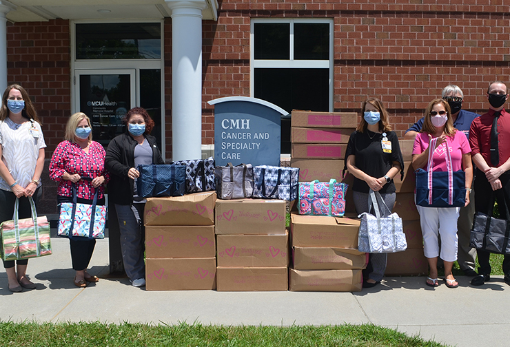 Penny Evans, an Independent Consultant with Thirty-One Gifts, facilitated community donations of 279 bags to the Hendrick Cancer and Rehab Center and to the Solari Radiation Therapy Center. Pictured are: Rebecca Sontag, Kim Baisey, PAR, Wendy Bohannon, RN; Teresa Collins, RN, BSN, OCN (all with VCU Heath CMH), and Penny, Sep and Jonathon Evans.