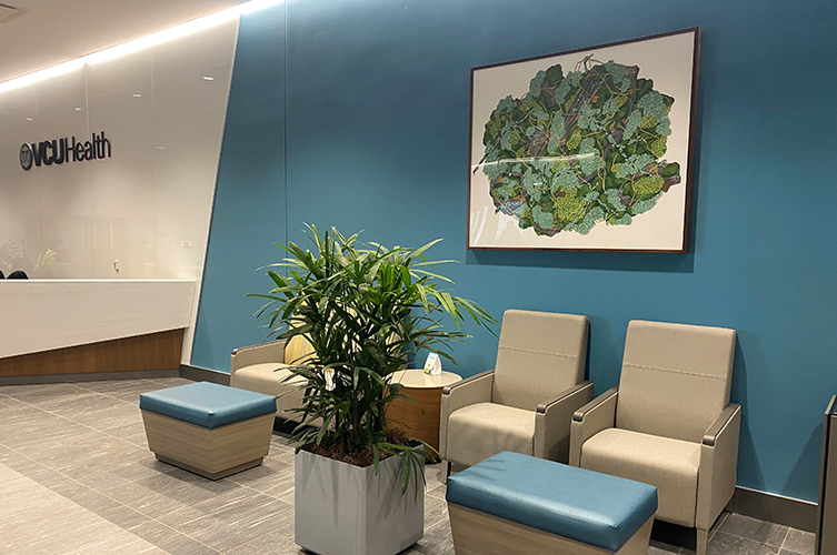 Hospital waiting room with painting.