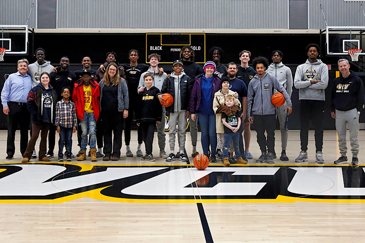CHOR patients and VCU basketball players on the VCU practice court
