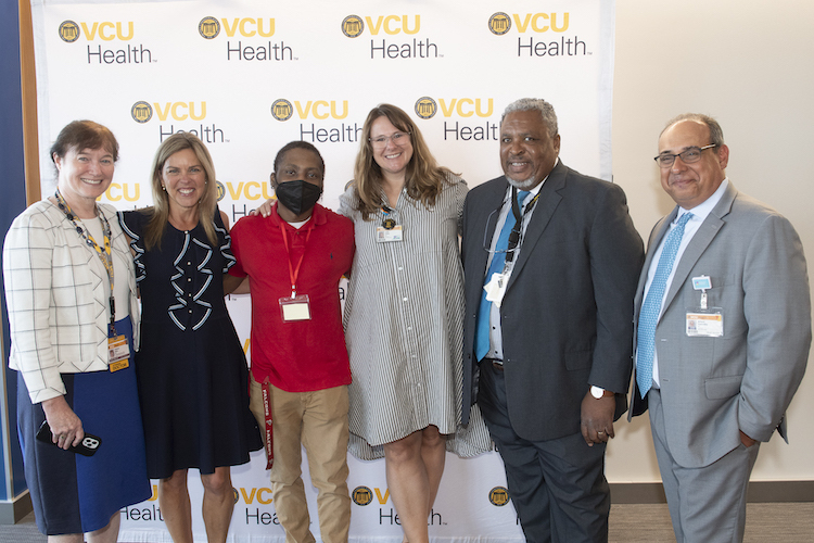 Group photo with a patient, VCU experts, and First Lady