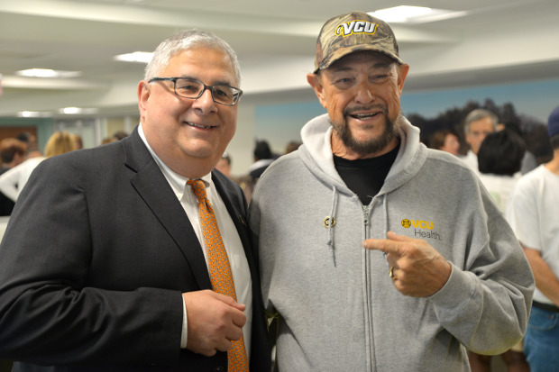 Marlon Levy, M.D., stands with Elmer Lynn, Jr. at VCU Health Hume-Lee Transplant Center’s celebration of its 5,000th transplant.