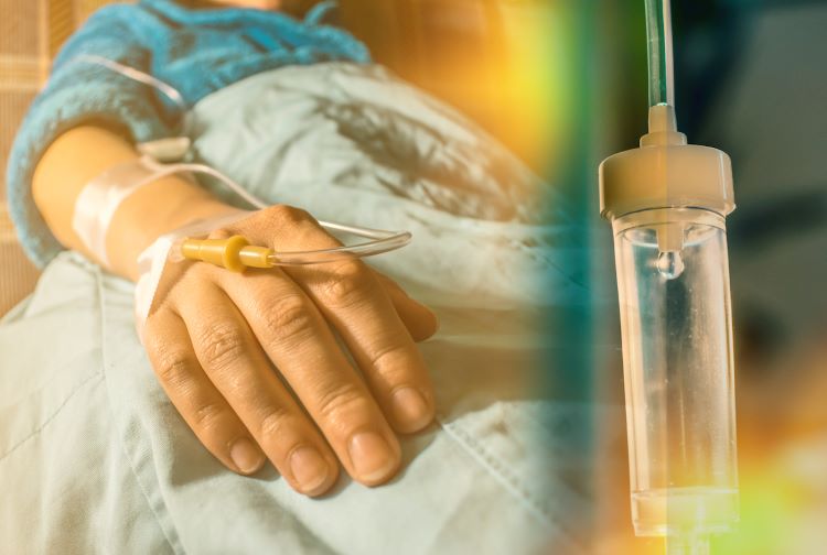 Close up of hand receiving IV treatment