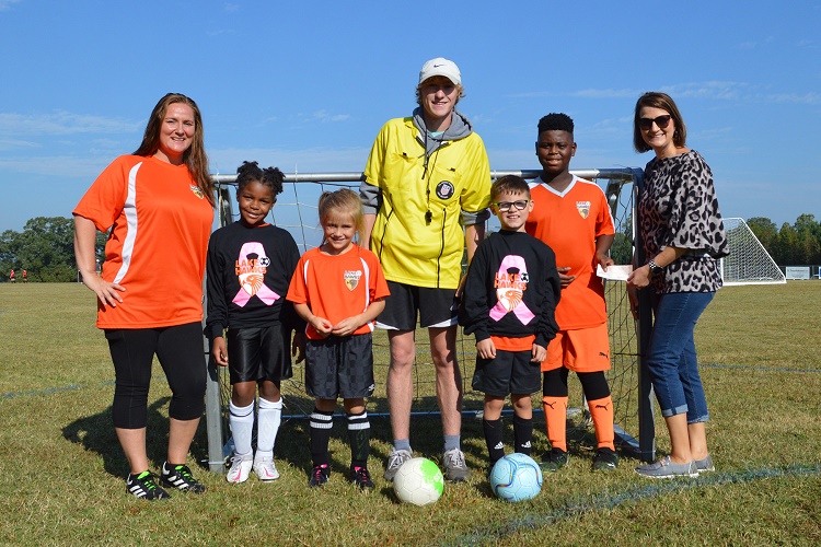 Lake Gaston Soccer Association members and players smiling