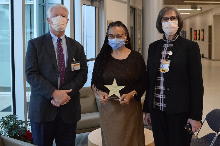 December Team Member of the Month, Sandra Agostinelli, with CMH team members