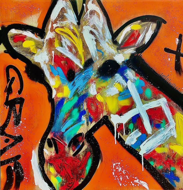 Mixed media art of a giraffe. The background is orange and the giraffe’s face has multiple colors including red, yellow, blue and white.