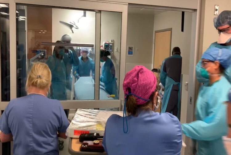 Surgery team prepping operating room