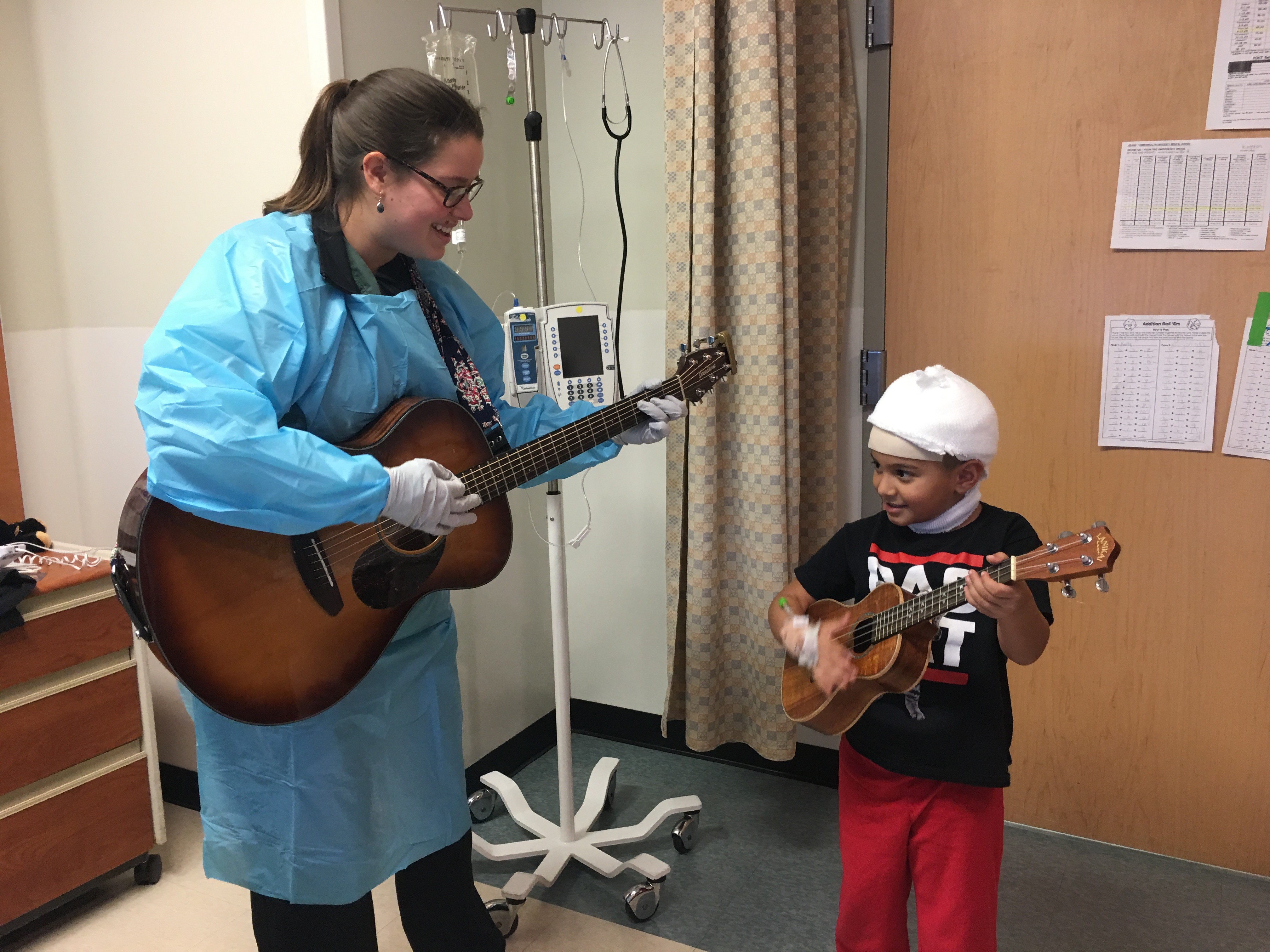 Music Therapist with a pediatric patient