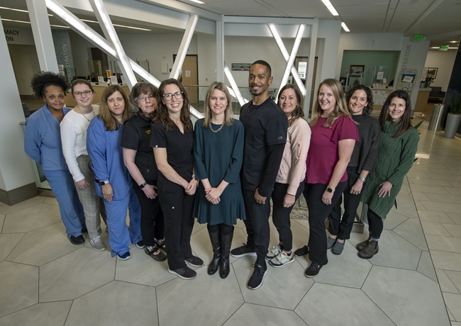 The team members at VCU Health ALS Clinic's Rapid Access Program standing in a row.