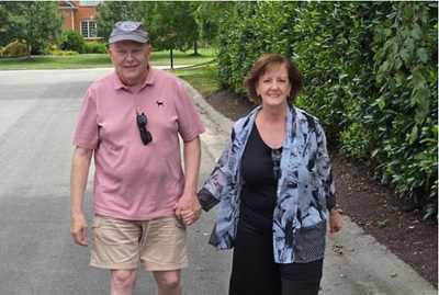 Bill Hobgood, a VCU Health NPH patient, taking a walk with his wife.