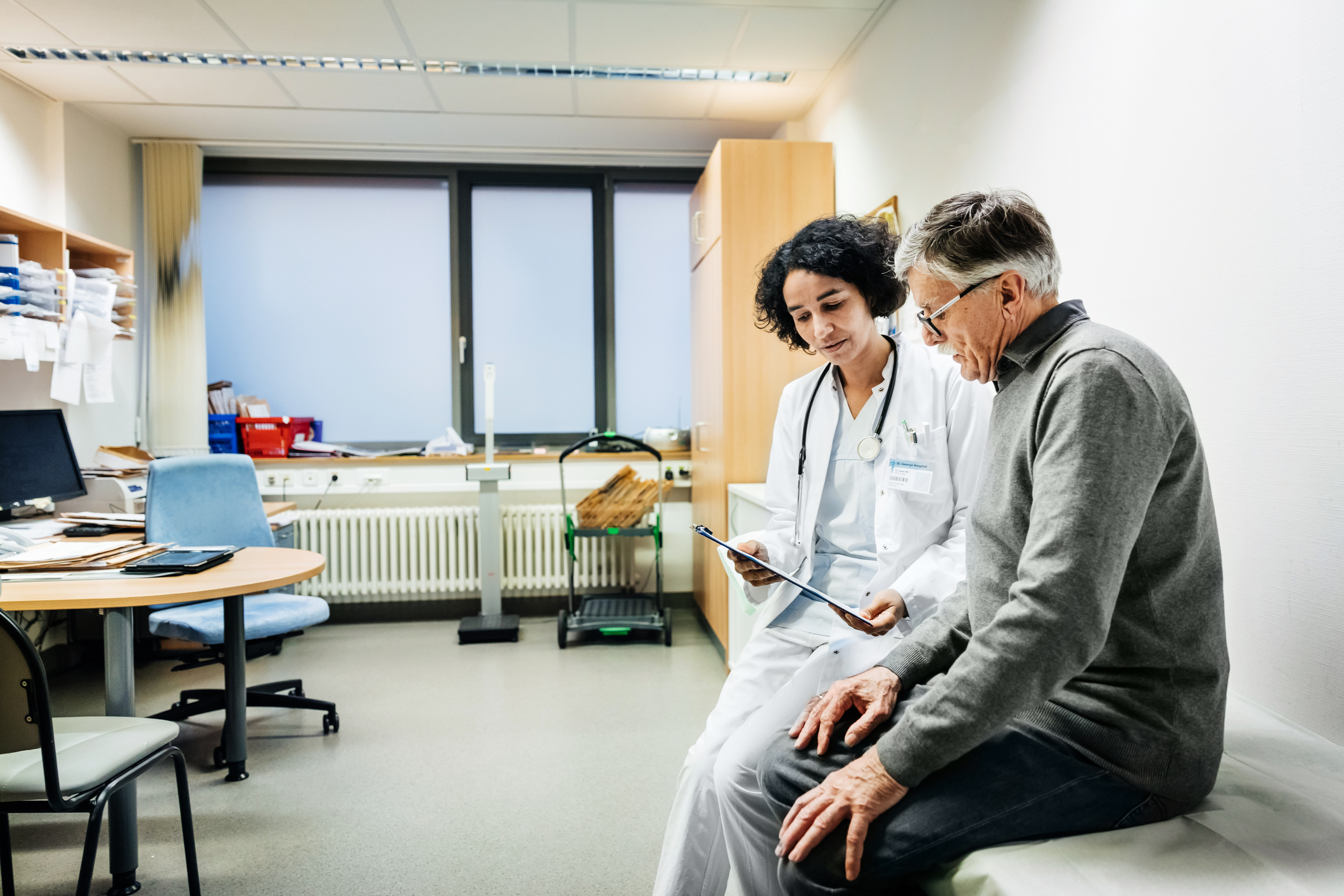 Male patient having a consultation with health care provider 