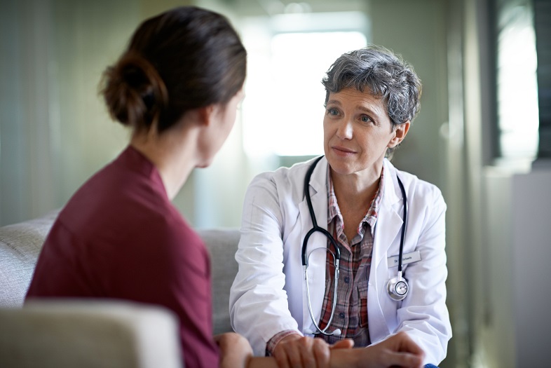 Female patient with a health care provider