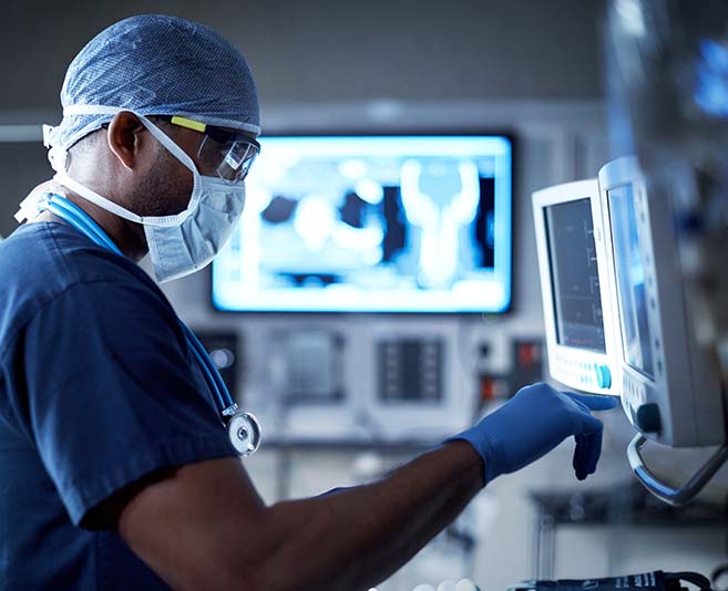 Health care provider looking at radiology images