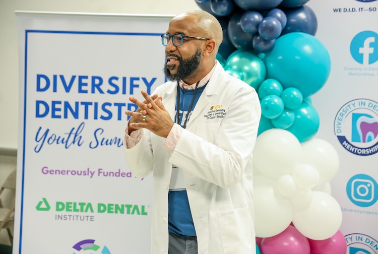 Dr. Carlos S. Smith giving remarks at event