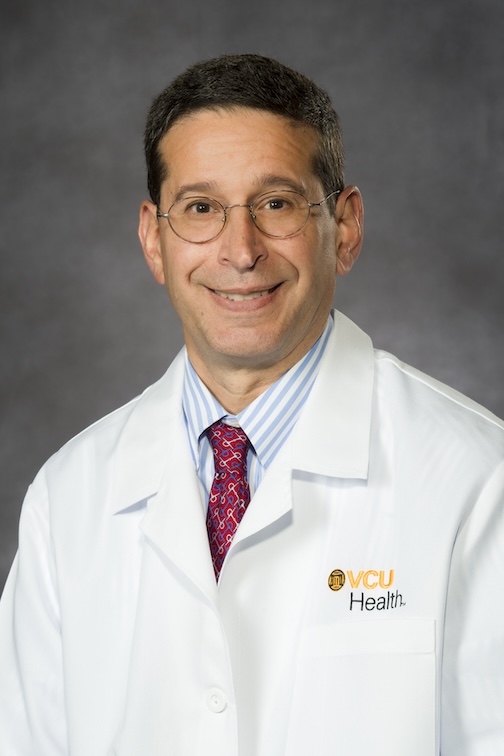 Dr. Kates in his medical white jacket