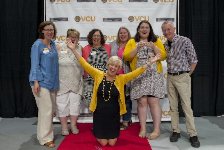 Group photo of people smiling
