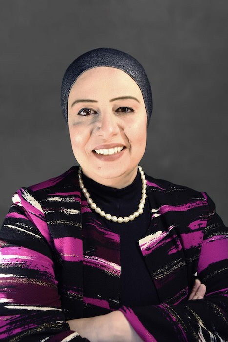 Dr. El Khoudary wears a black and pink shirt