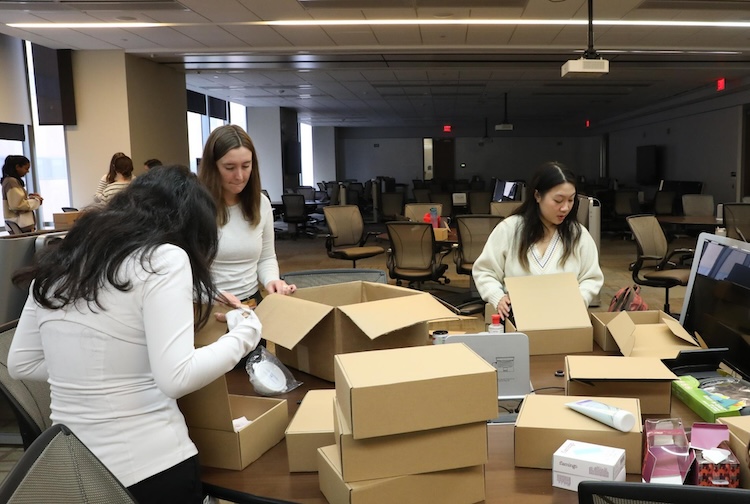 Volunteers packing care packages