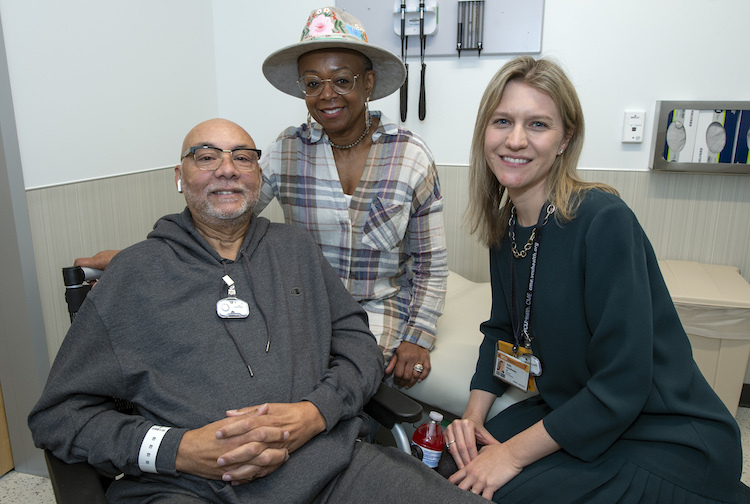 Patient and caregiver with their doctor