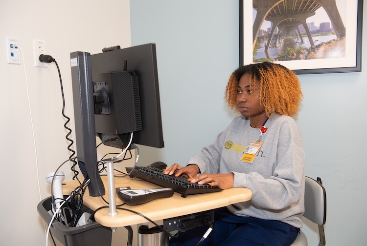 Woman at a desk working