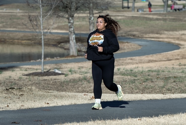 Woman running in a park
