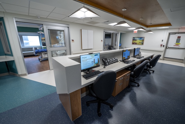 Hallway in unit with space for nurses