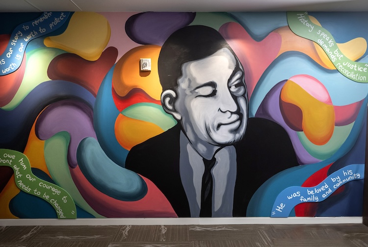 Mural painting of Bruce Tucker on the wall