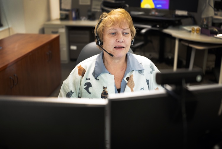 Dispatcher for the poison center takes a call