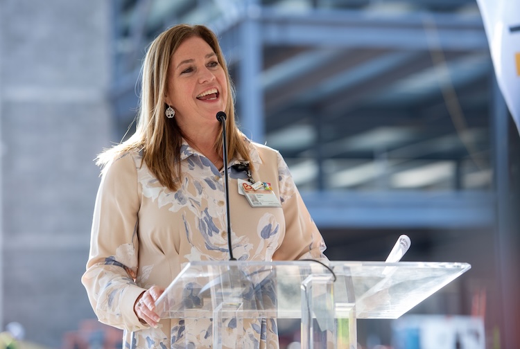 Woman standing at podium