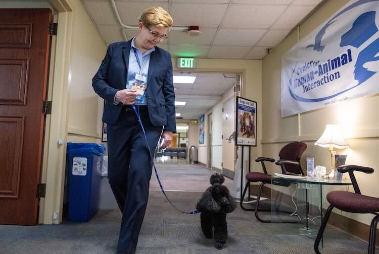 Dr. Gee and Allie walking in the hallway
