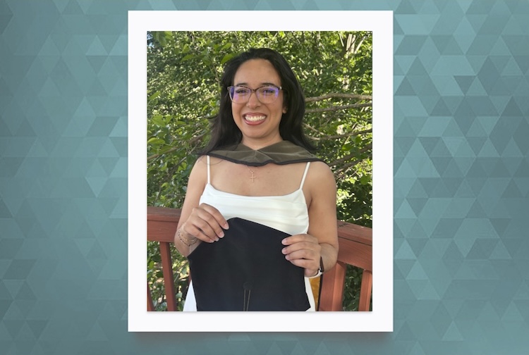 Angela in her cap and gown and a white dress