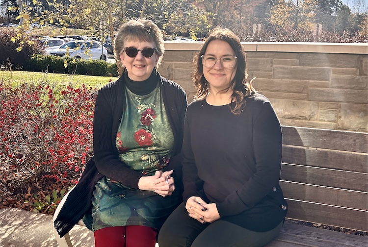 Stroke survivor sits meets with the VCU Health nurse who took care of her