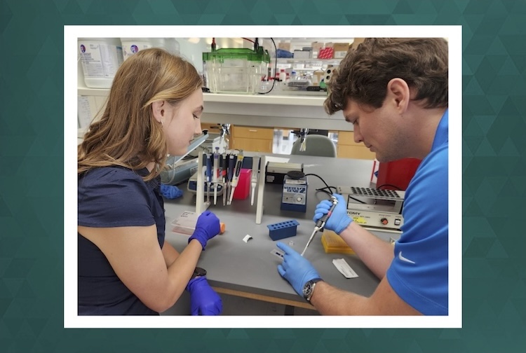 Sydney pipetting with Matthew Dalton in a lab