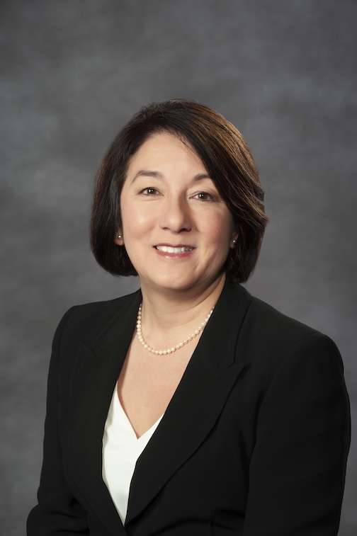 Woman in a black suit jacket