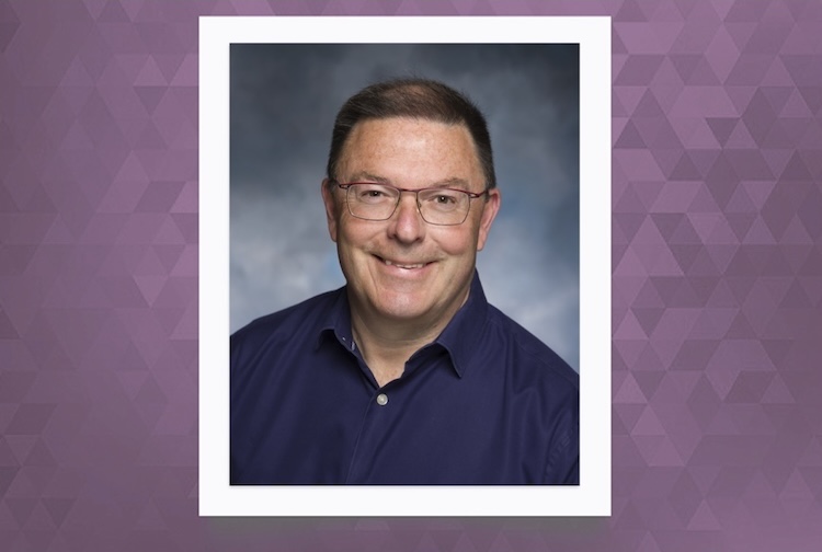 Man wearing a blue collar shirt.
