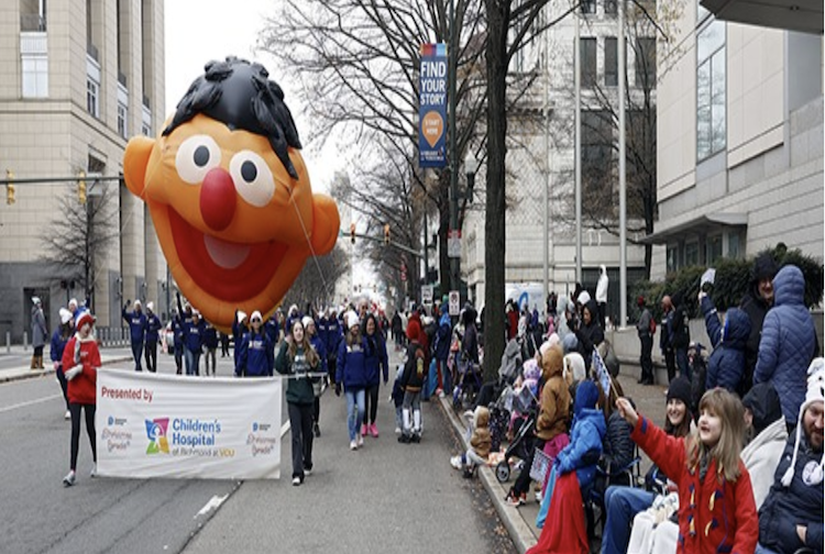 Crowds on the street watching the Dominion Energy Parade pass by CHoR