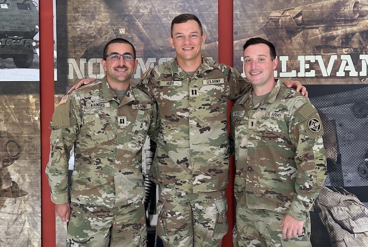 Evan in his army uniform with two other officers
