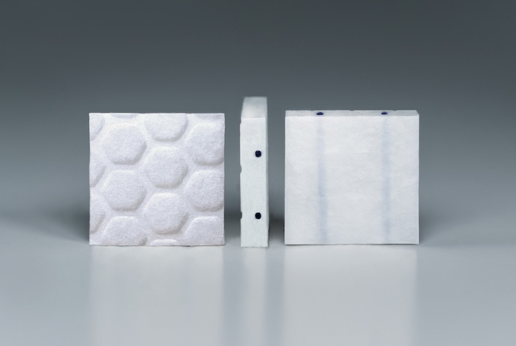 Small white tiles filled with radiation are inserted into the brain where a tumor is removed