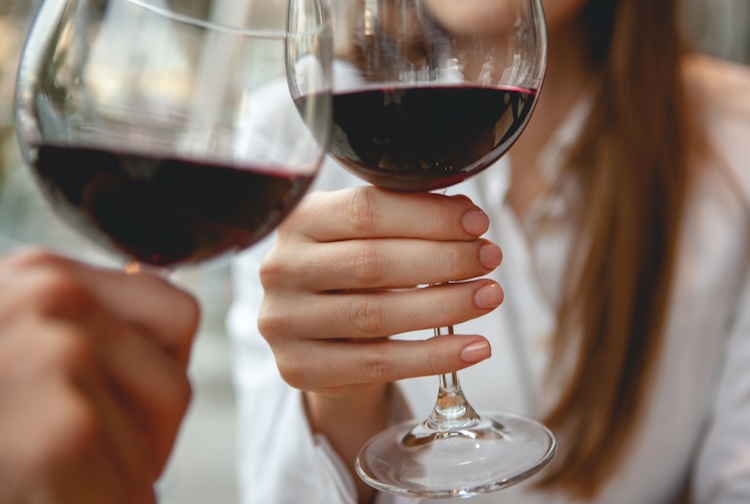 Friends toasting with red wine