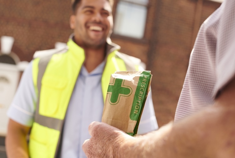 Pharmacy delivery to an older man