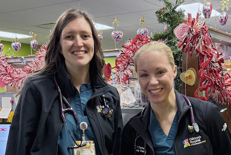 Two female doctors in scrubs