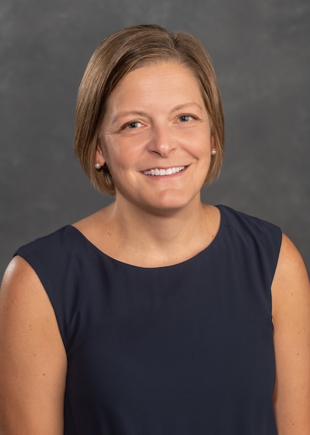 Dr. Bohl wearing a black dress.