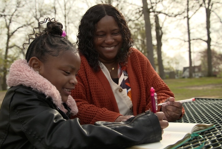 Chwanda with her granddaugther in a park