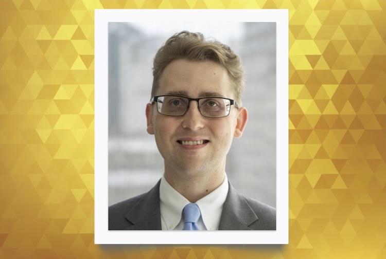Man in suit and glasses