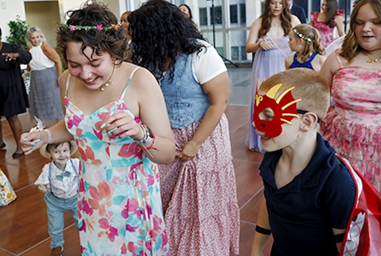 Kids dressed up and dancing
