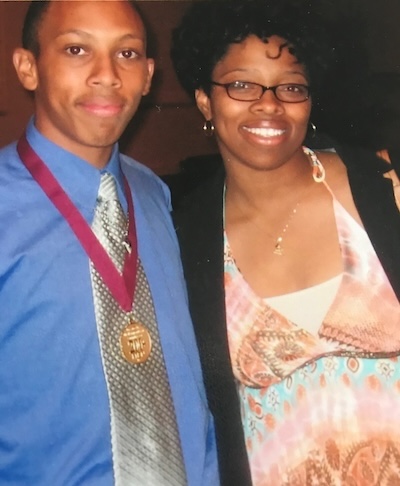 Marcus and his sister Stephanie at an award ceremony for Marcus.