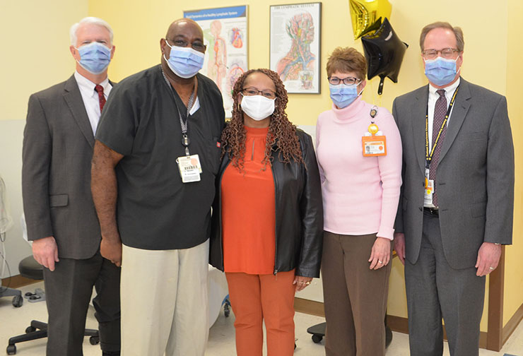 Scott Burnette, Calvin Richardson, Loretta Richardson, Donna Jarrell, Todd Howell gather to celebrate Calvin winning the VCU Health CMH 2020 Team Member of the Year.