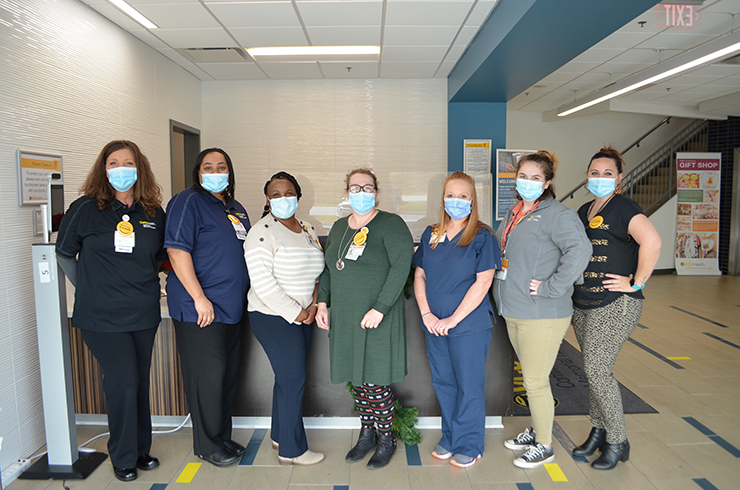 VCU Health CMH C.A.R.E. lobby staff pictured are Kimberly Statesberry, Tarshiana Wyche, Shermeco Pulliam, Pam Elder, Marian Jackson, Charlate Traylor and Sherry Crickenberger.