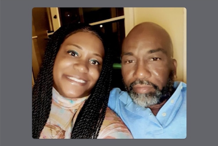 Man and woman smile for camera